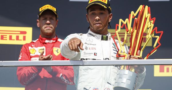 Foto: Sebastian Vettel pasó primero por la meta del GP de Canadá, pero la victoria fue para Lewis Hamilton. (EFE)