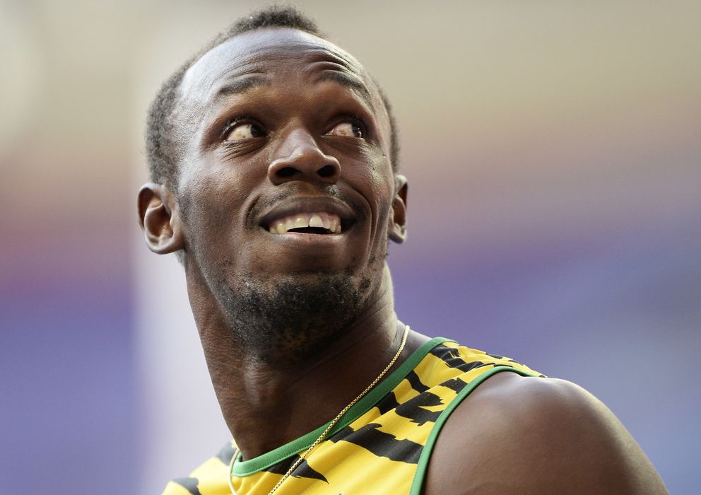 Foto: Bolt sonríe tras haber conseguido el oro (Reuters).