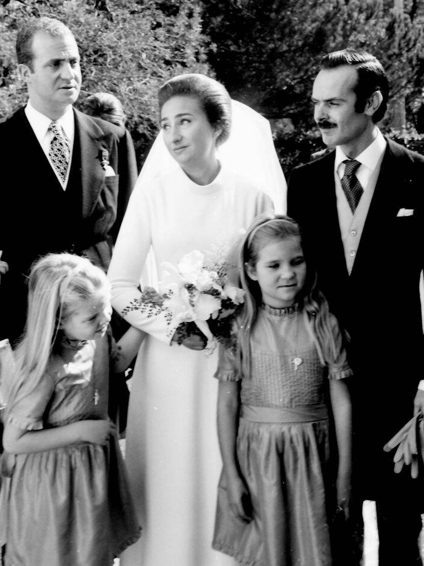 El matrimonio con don Juan Carlos y las infantas Elena y Cristina. (Getty)