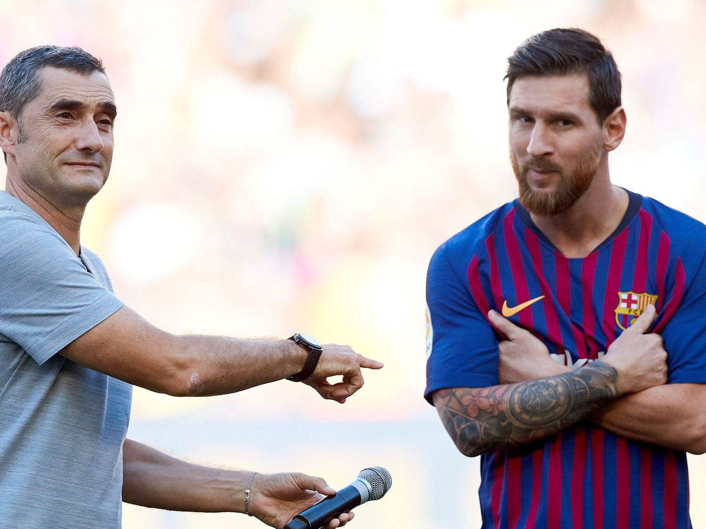 Ernesto Valverde y Leo Messi, en la pretemporada de agosto de 2018. (EFE)