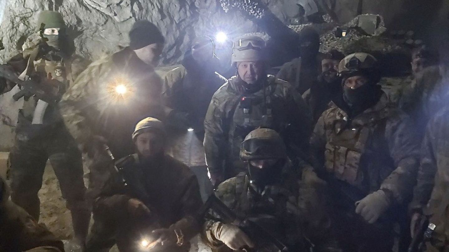 People in military uniform, claimed to be soldiers of Russian mercenary group Wagner and its head Yevgeny Prigozhin, pose for a picture believed to be in a salt mine in Soledar in the Donetsk region, Ukraine, in this handout picture released January 10, 2023. Press service of 