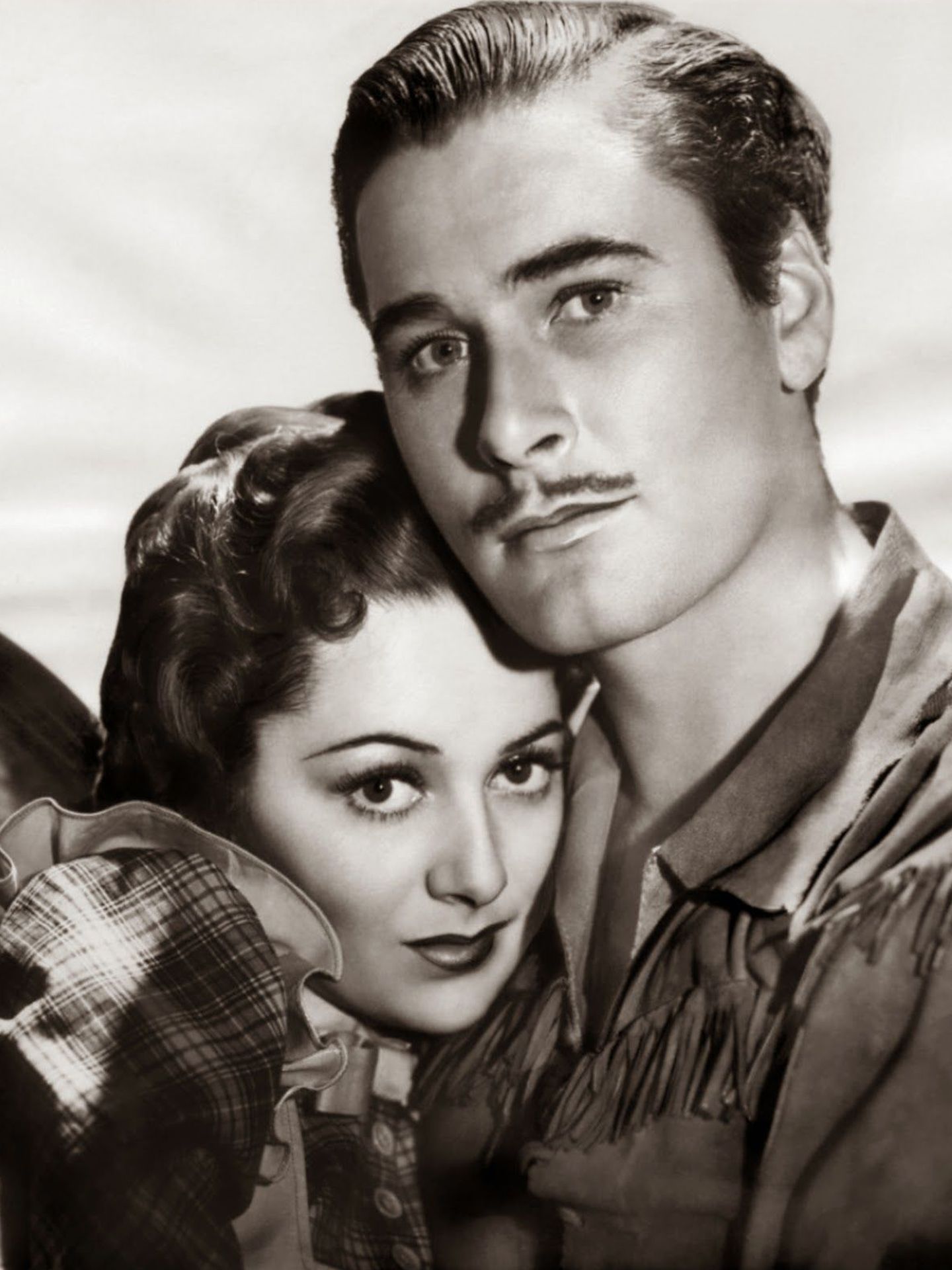 Errol Flynn y Olivia de Havilland en 'Dodge, ciudad sin ley' (Warner)