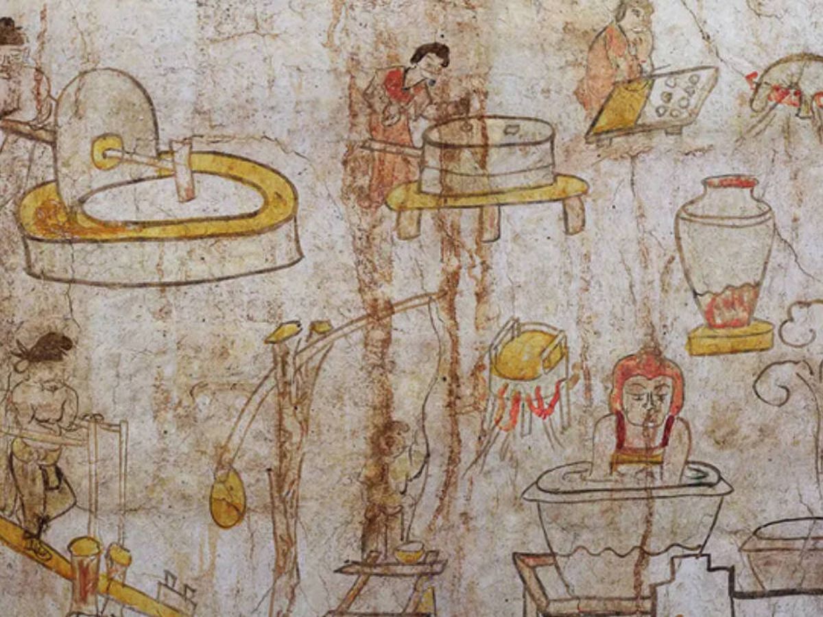 Foto: Detalle de la pintura de la tumba con una figura de aspecto occidental sacando agua de un pozo. (Instituto de Arqueología de la Provincia de Shanxi).  