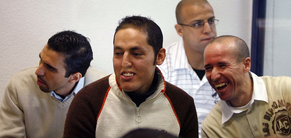 Jamal Zougam, Rachid Aglif, Rafa Zouhier y Abdelilah El Fadual, durante el juicio del 11-M. (Reuters)