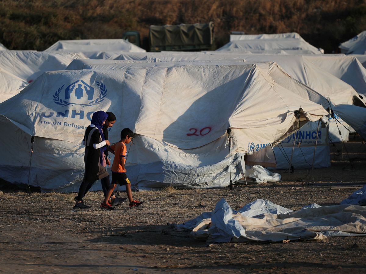 Foto: Llegan los refugiados al nuevo campamento de Moria. (Reuters)
