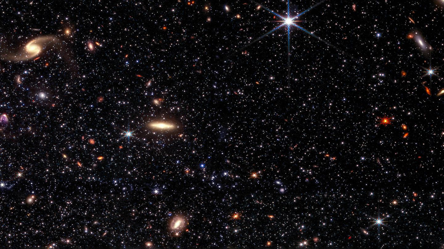 La última imagen del James Webb muestra una porción de la galaxia enana Wolf–Lundmark–Melotte contra un fondo cósmico de galaxias. (NASA)