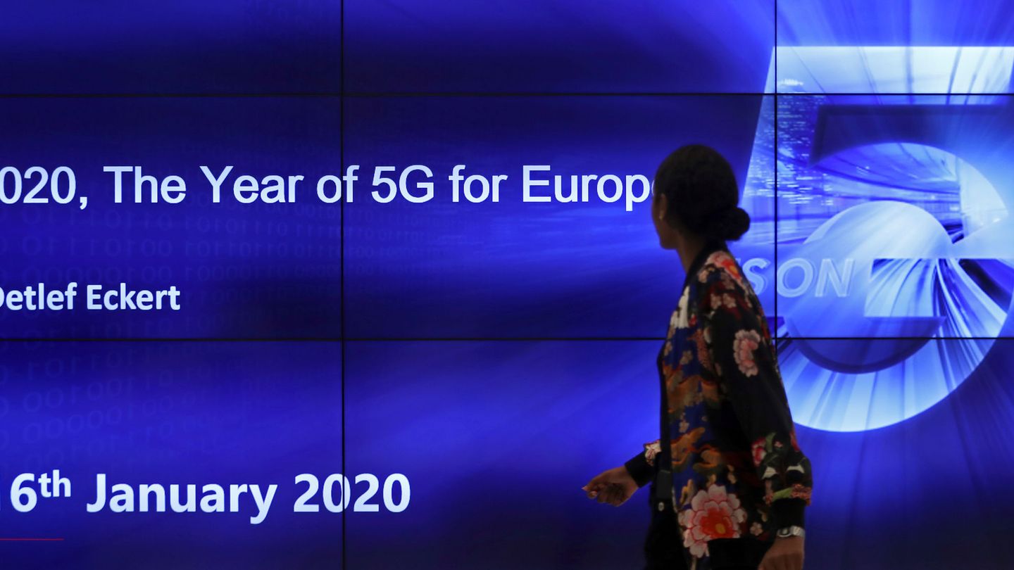 FILE PHOTO: A woman attends the '2020, The Year of 5G for Europe' conference at the Huawei Cyber Security Transparency Centre in Brussels, Belgium, January 16, 2020  REUTERS Yves Herman File Photo