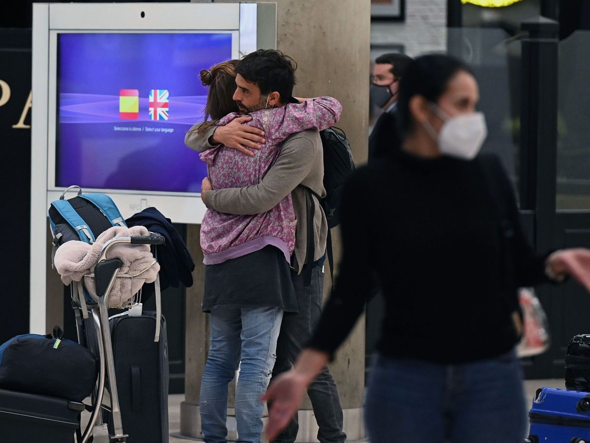 Foto: - Vista de los pasajeros a su llegada al aeropuerto Adolfo Suárez Madrid Barajas este lunes. (EFE)