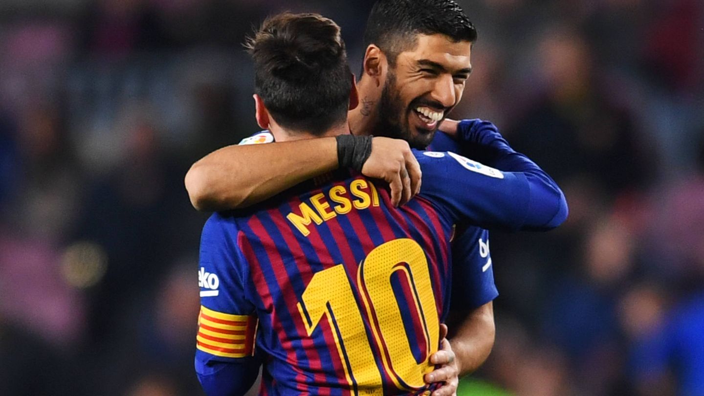 Messi y Luis Suárez celebran un gol. (Getty)