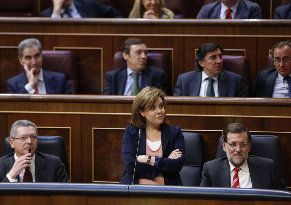Foto: Santamaría (c), Rajoy (d) y Ruiz-Gallardón (i). (EFE)