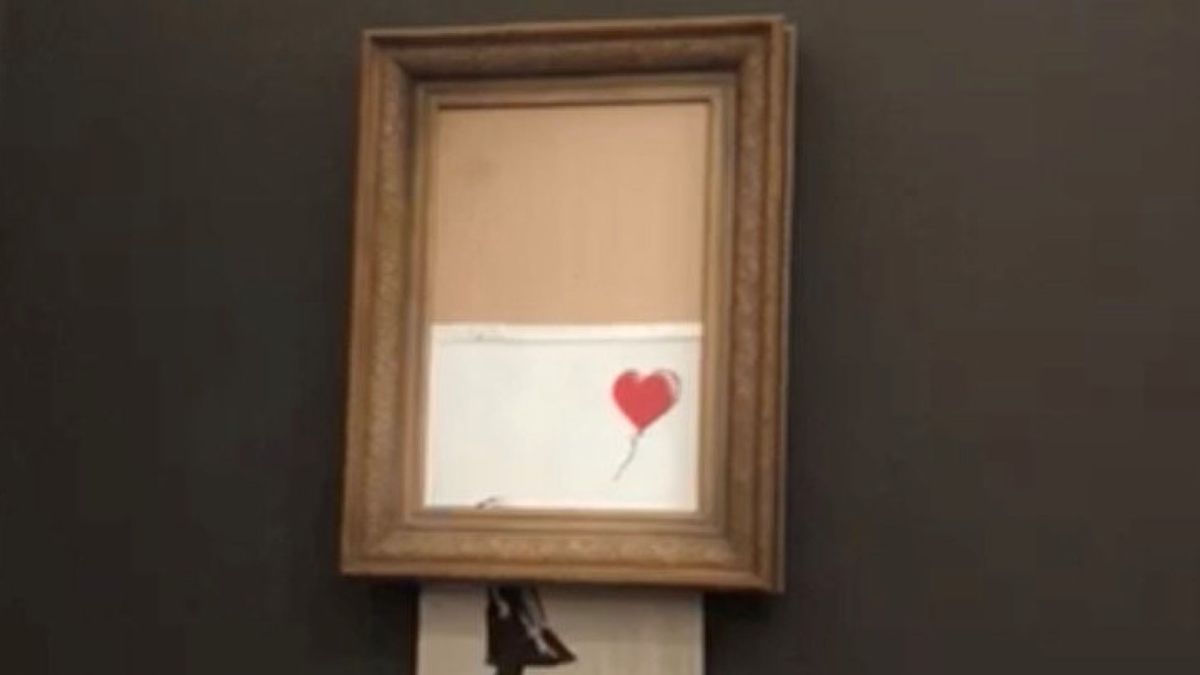 Una famosa obra de Banksy se autodestruye después de ser subastada por 1 M de euros
