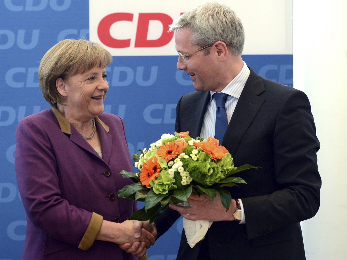 Foto: Norbert Röttgen y Angela Merkel, en una imagen de archivo de 2012. (EFE)