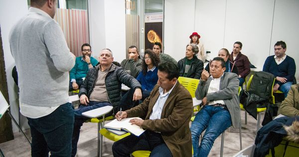 Foto: Una charla en Madrid para atraer pequeños inversores en minado de criptomonedas.