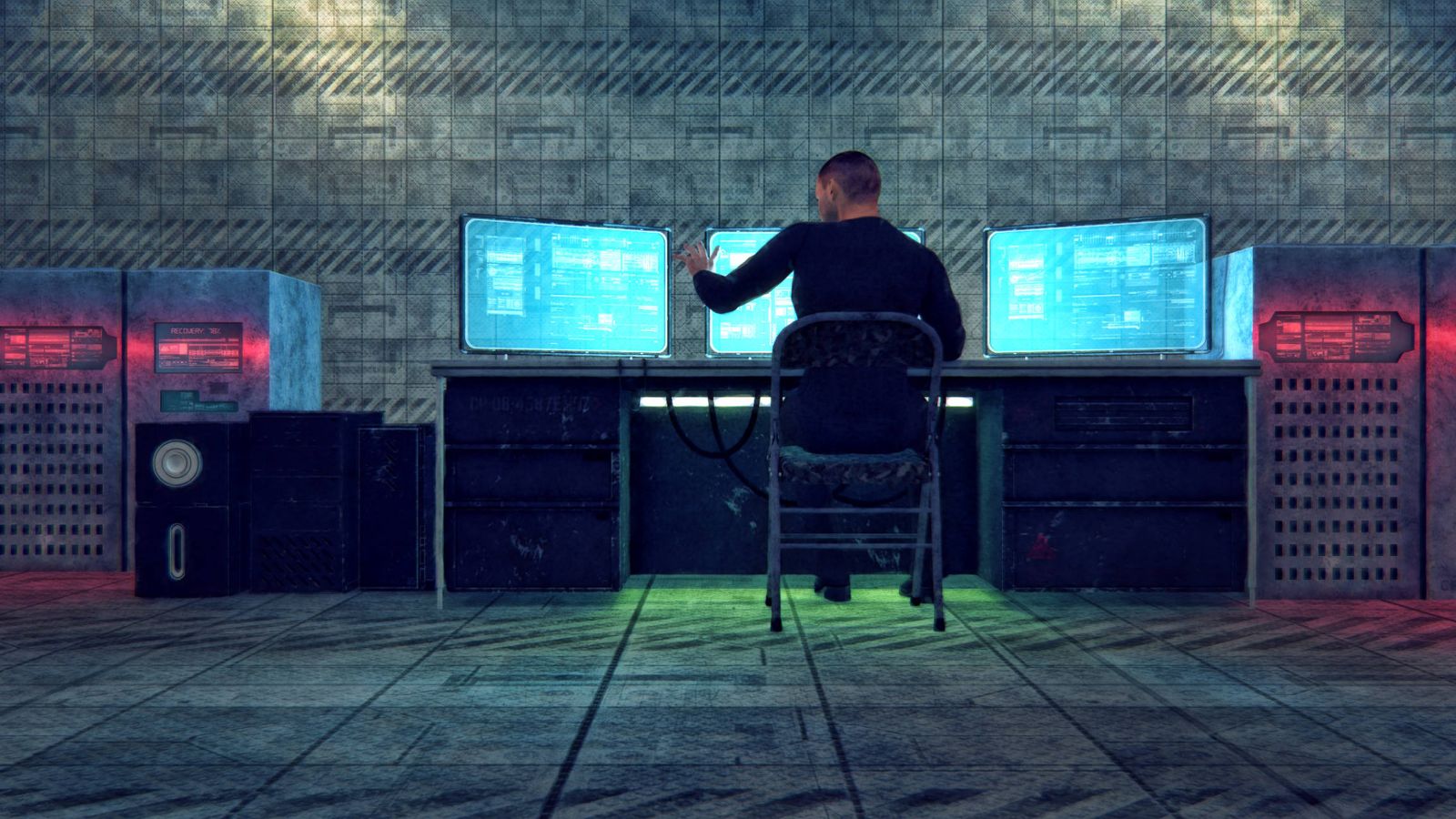 Foto: Un 'hacker' trabaja con varias pantallas. (iStock)