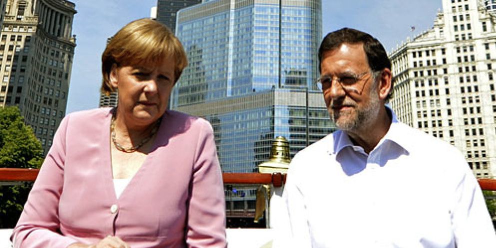 Foto: Rajoy recibe el aval de Merkel y pide que otros países examinen su banca