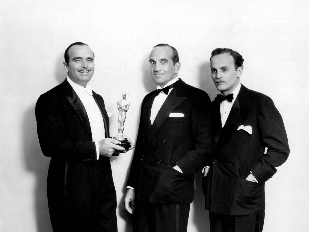 Foto: Douglas Fairbanks, junto a Al Jolson (en el centro) y el productor Darryl F. Zanuck en la primera ceremonia de los Oscar. (CP)