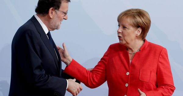 Foto: Mariano Rajoy, junto a Angela Merkel, en un encuentro europeo. (Foto: Reuters)