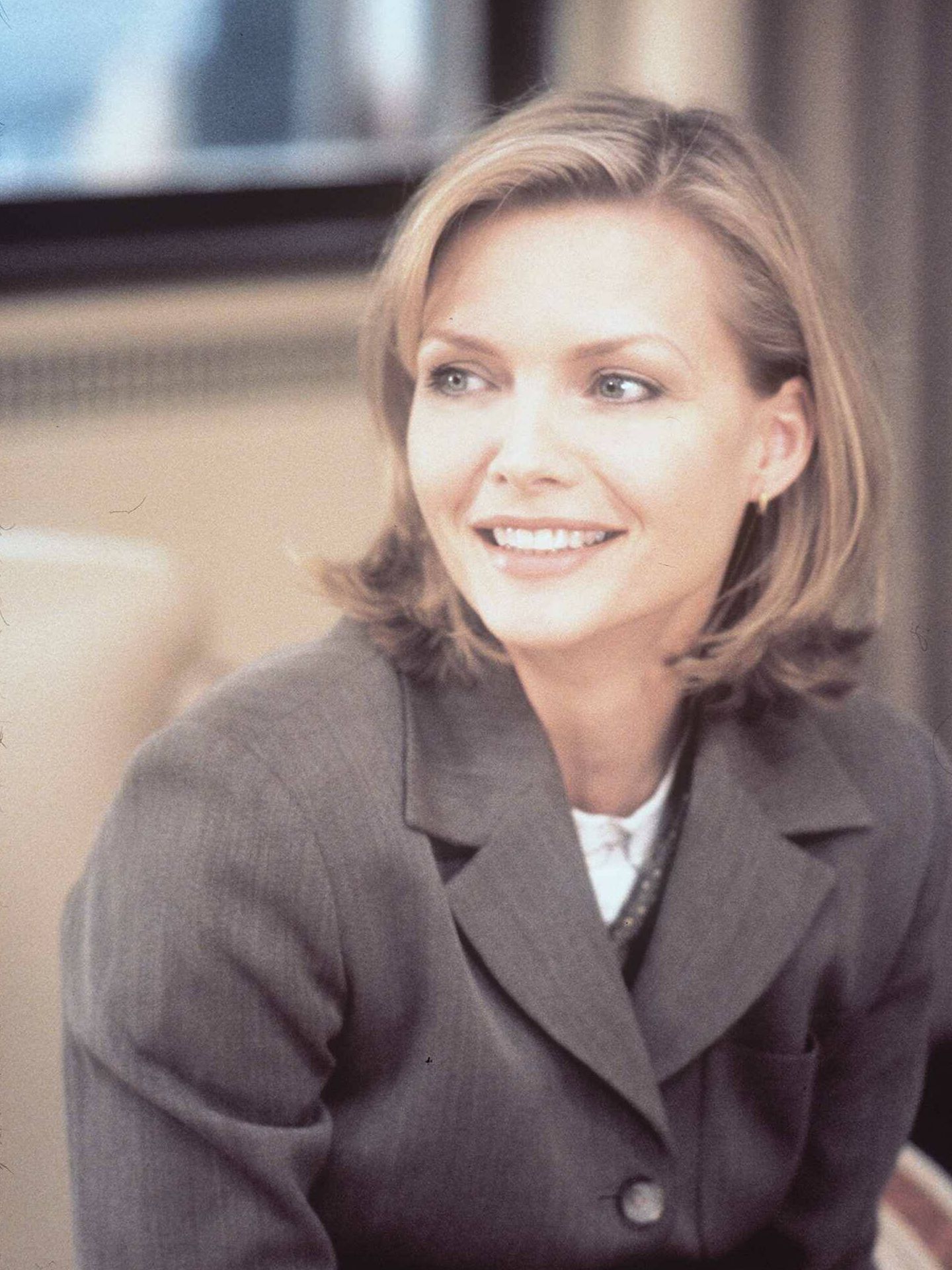 Michelle Pfeiffer, en la película 'Un día inolvidable' (1996), en la que aparecía junto a George Clooney. (Getty)