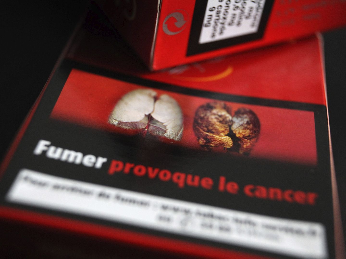 Cajetillas con pulmones afectados por el tabaco. (EC)