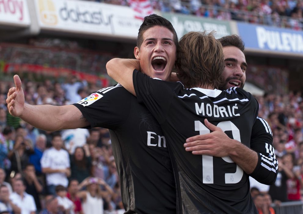 Foto: Modric y Carvajal celebran el gol de James (AP).