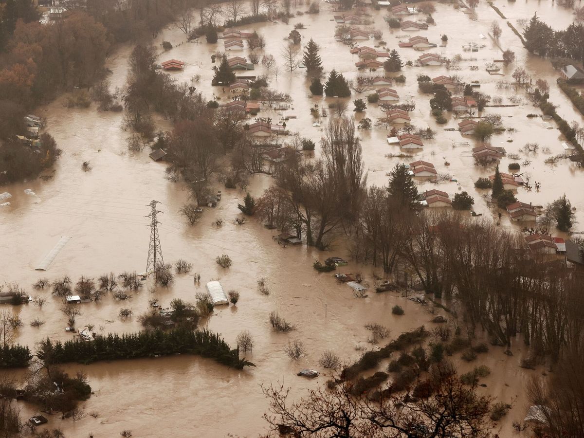 Foto:  Vista aérea de las inundaciones ocasionadas por el desbordamiento río Arga. (Jesús Diges/EFE)