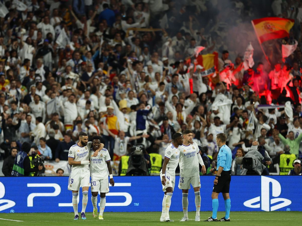 Foto: El Madrid celebra tras el pitido final. (EFE/Yoan Valat)