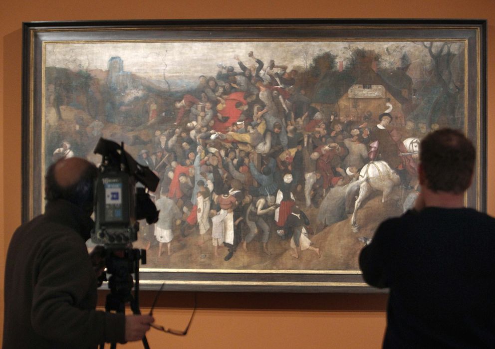 Foto: Muestra de la restauración de 'El vino de la fiesta de San Martín', de Pieter Bruegel el Viejo. (Efe)