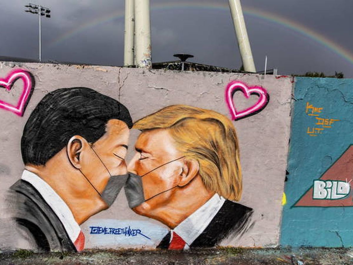 Foto: Mural callejero en Berlín con las imágenes de Xi Jinping y Donald Trump, presidentes de China y EEUU