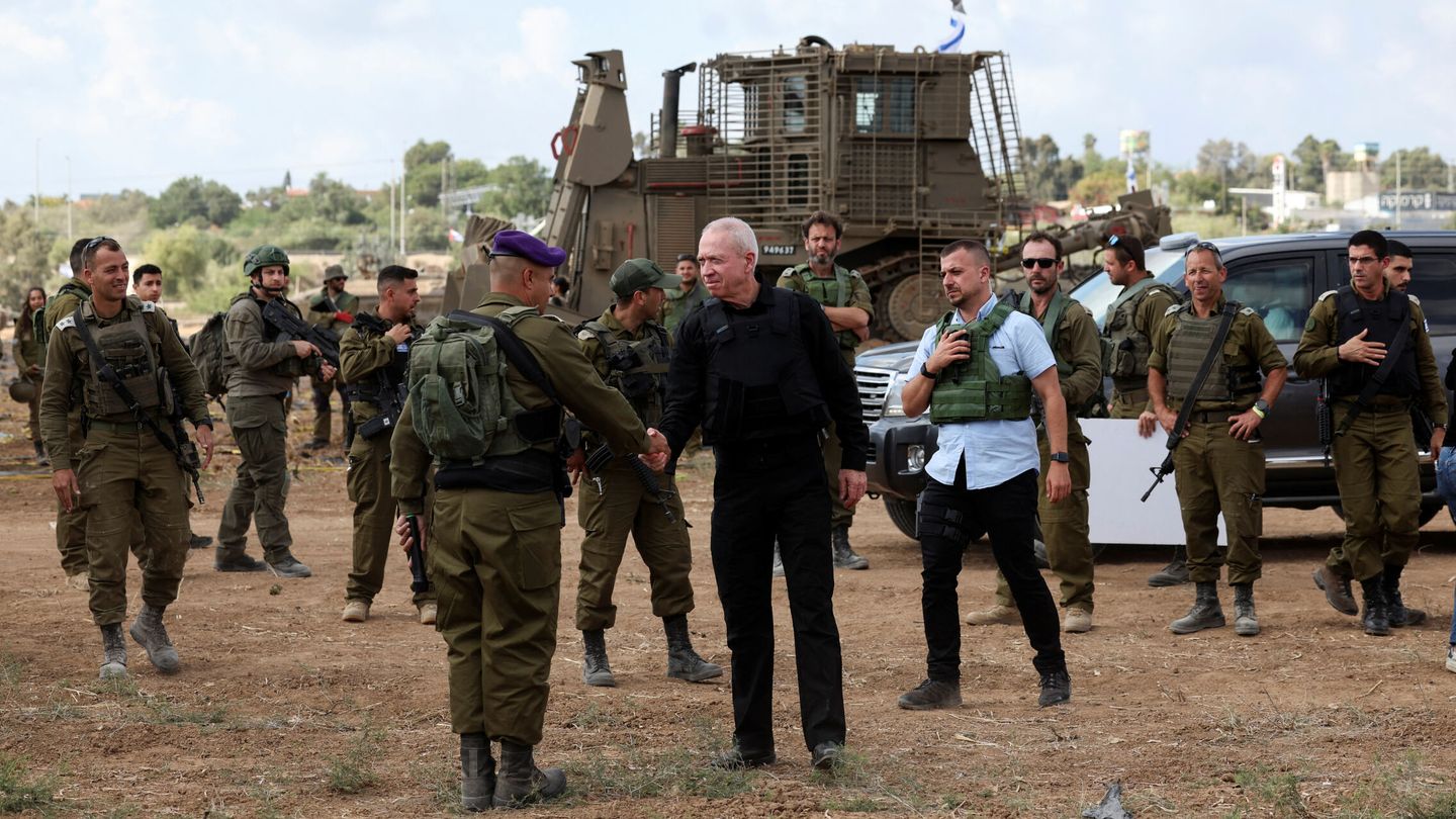 Israel's Defence Minister Yoav Gallant meets soldiers in a field near Israel's border with the Gaza Strip, in southern Israel October 19, 2023. REUTERS Ronen Zvulun