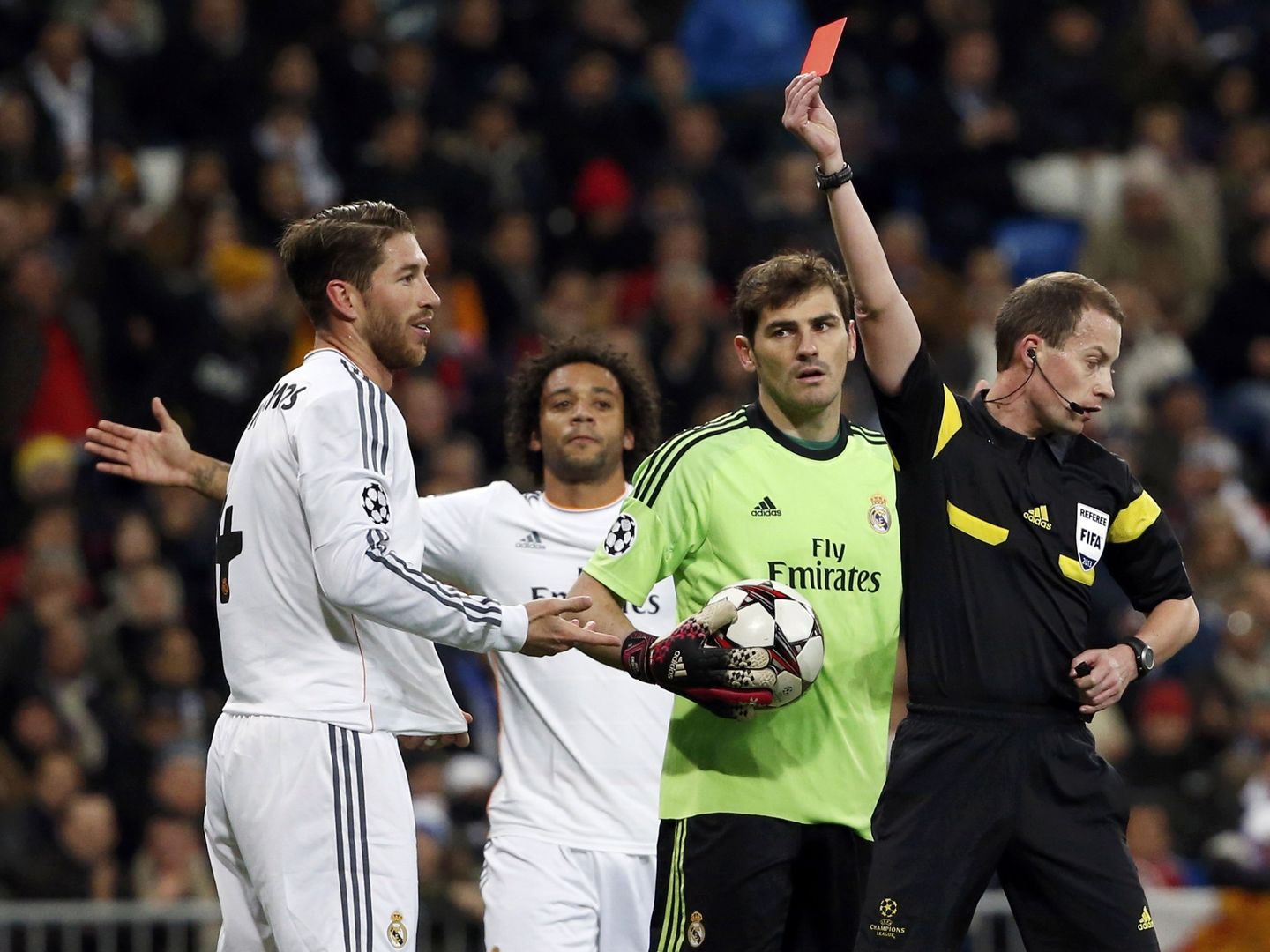 Referee collum shows a red card to real madrid's ramos during their champions league soccer match in madrid
