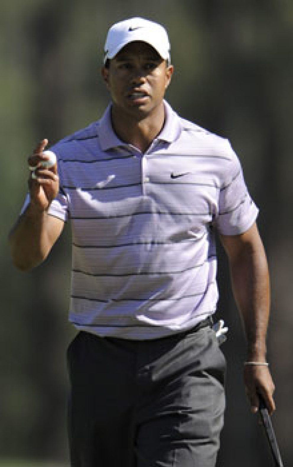Foto: Tiger Woods pone cerco a Lee Westwood