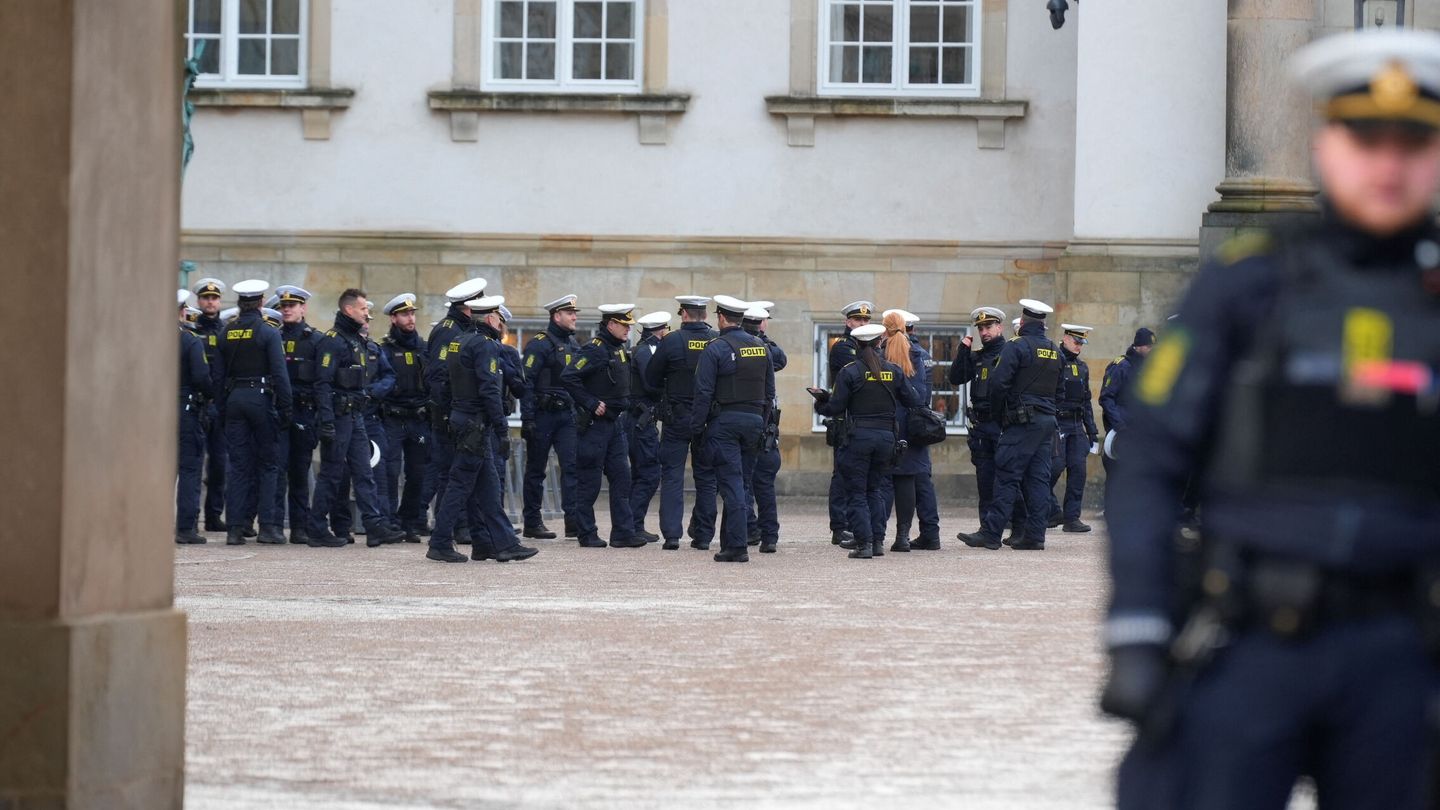 Police officers stand at the Christiansborg Castle, on the day Denmark's Queen Margrethe abdicates after a reign of 52 years and her elder son, Crown Prince Frederik, ascends the throne as King Frederik X in Copenhagen, Denmark, January 14, 2024. Ritzau Scanpix Emil Helms via REUTERS    ATTENTION EDITORS - THIS IMAGE WAS PROVIDED BY A THIRD PARTY. DENMARK OUT. NO COMMERCIAL OR EDITORIAL SALES IN DENMARK.