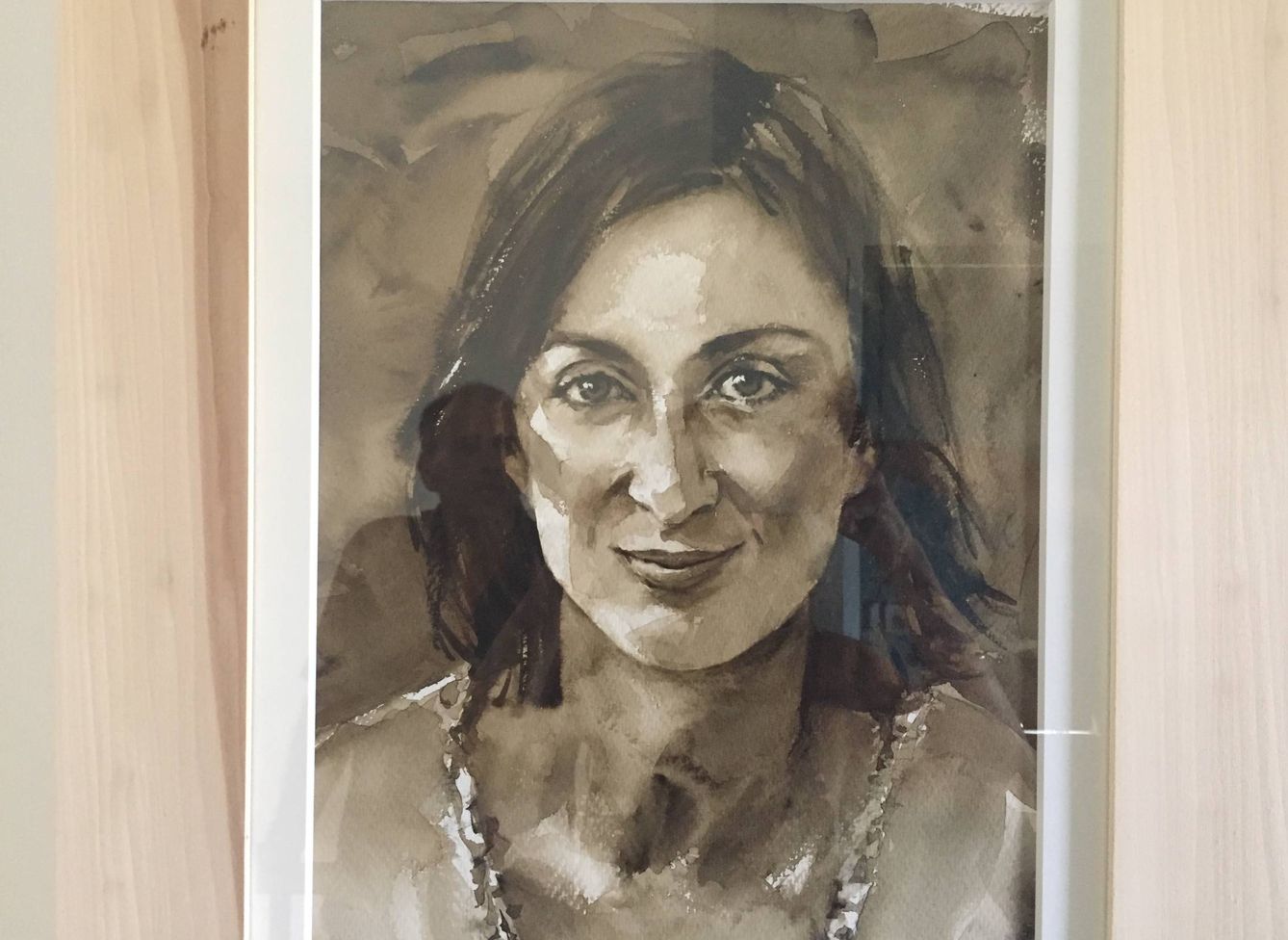 Imagen de un retrato de Daphne Caruana Galizia colgado en su casa de Malta.(Corinne Vella)