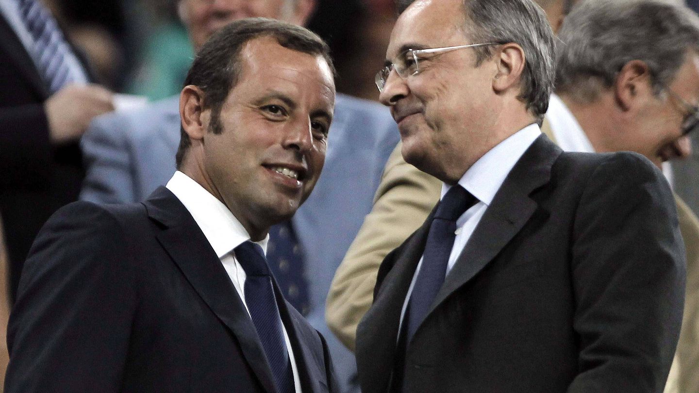 Sandro Rossel y Florentino Pérez, en el Camp Nou. (EFE/Alberto Estévez)