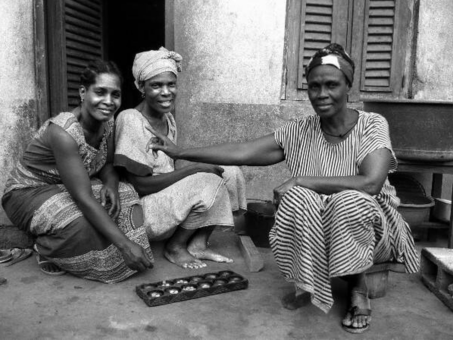 Mujeres jugando a Oware.