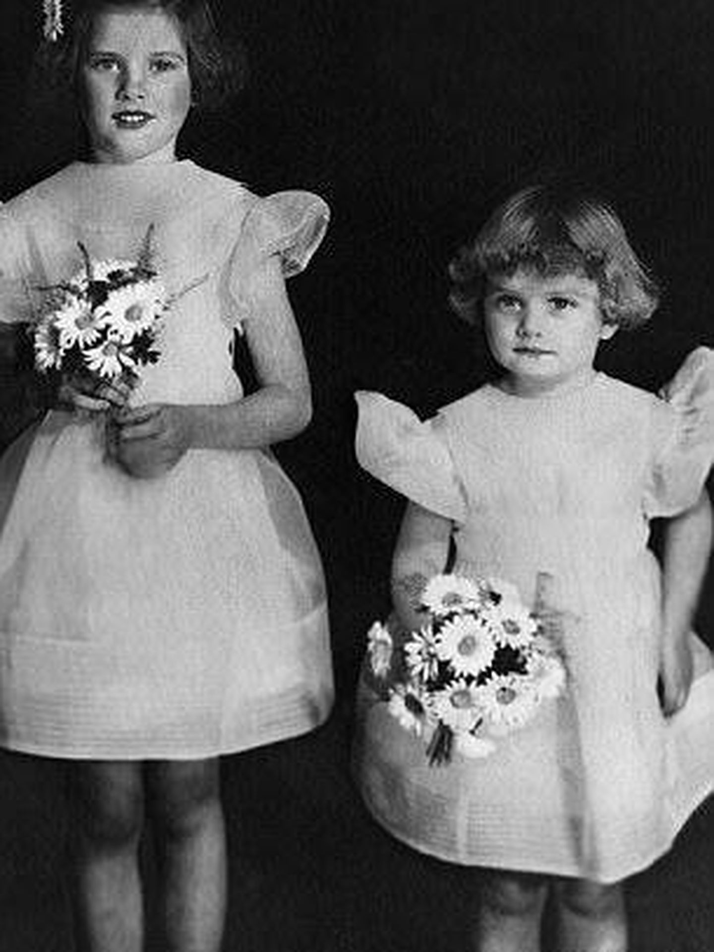 Grace Kelly, a la edad de 9 años, junto a su hermana menor Lizanne. (Cordon Press)