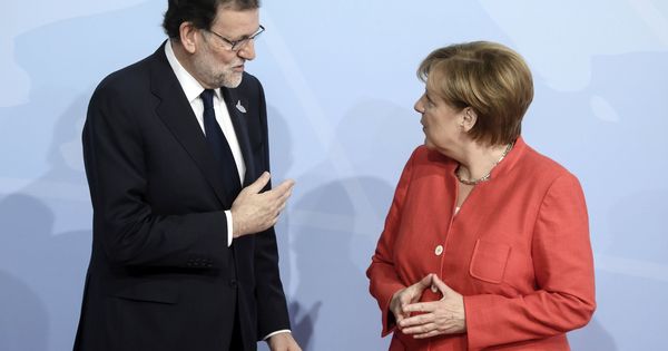 Foto: Fotografía de archivo de la canciller alemana, Angela Merkel, y el expresidente del Gobierno Mariano Rajoy. (EFE)