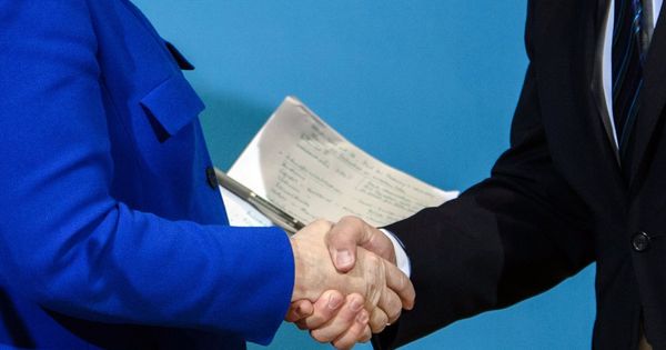 Foto: Merkel y Schulz confirman un preacuerdo para una gran coalición. (EFE)