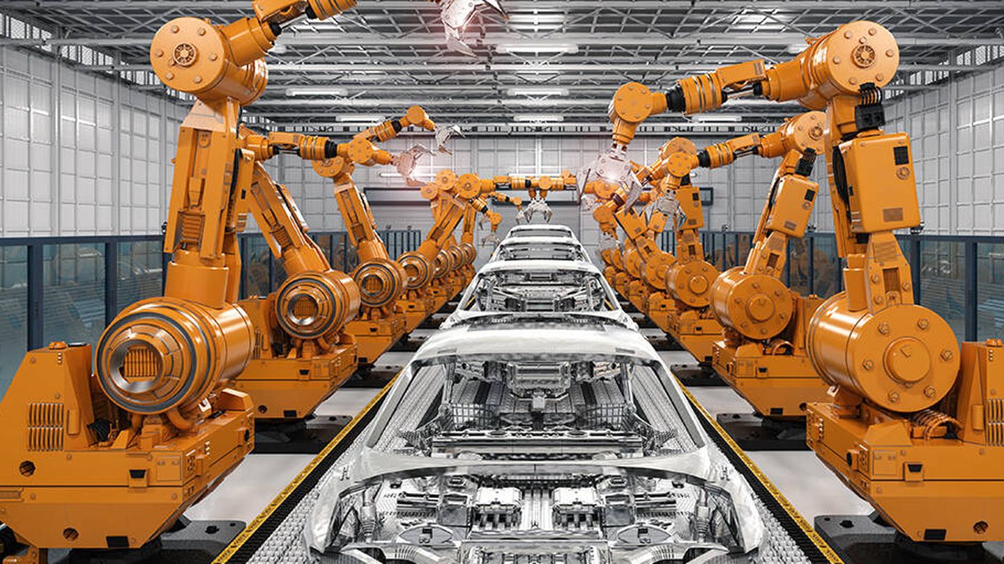 Robots en fábrica de automóviles. (iStock)