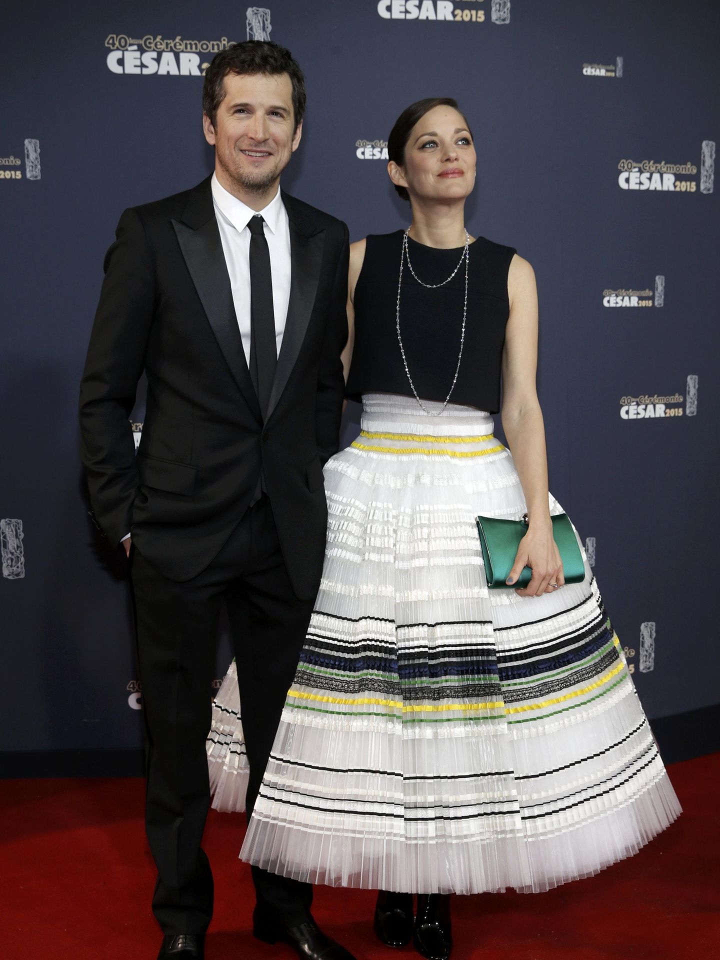 Guillaume Canet y Marion Cotillard, en los premios Cesar de 2015. (Reuters/Christian Hartmann)