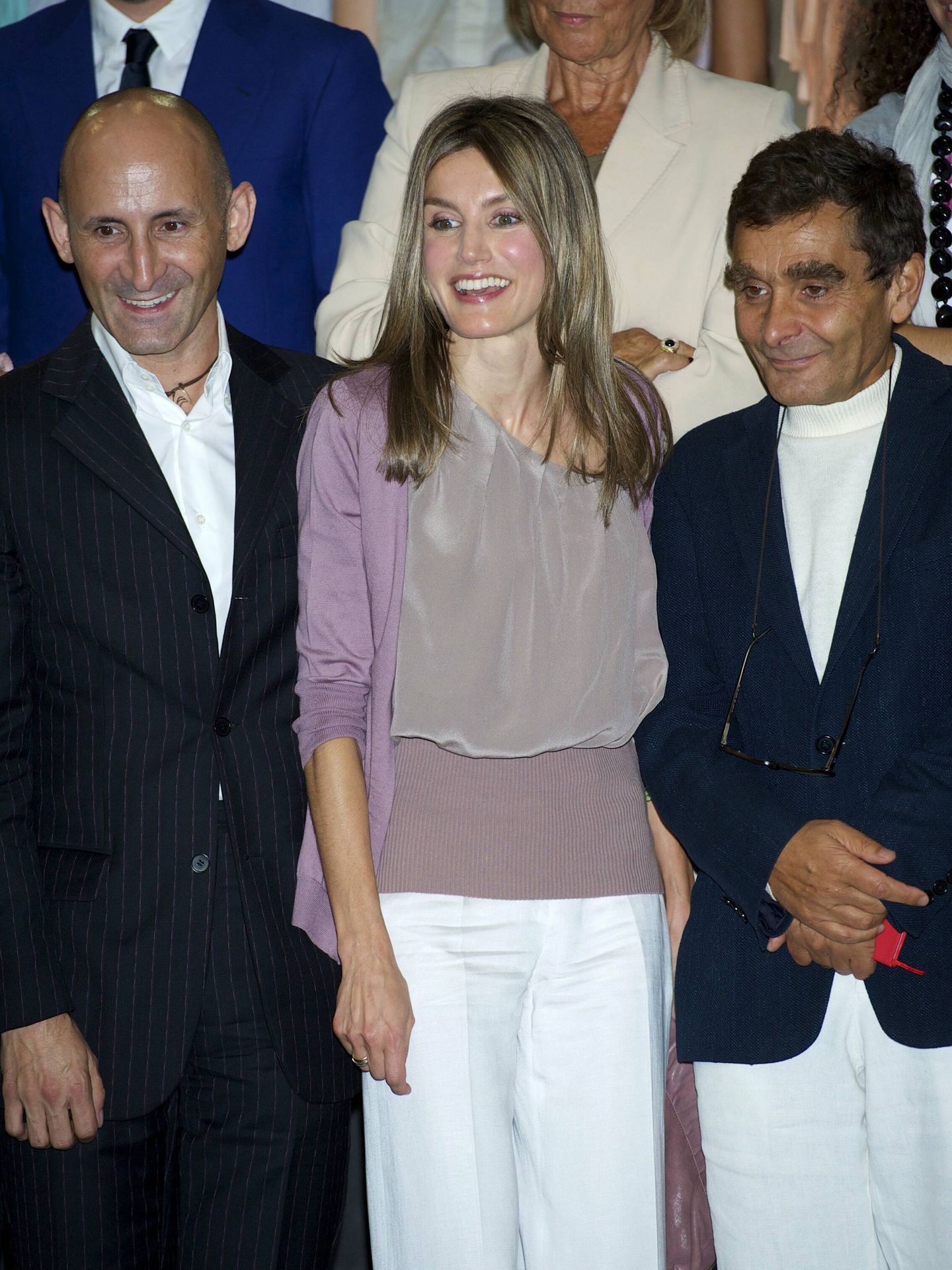 La entonces Princesa de Asturias, junto a Modesto Lomba y Adolfo Domínguez. (Cordon Press)