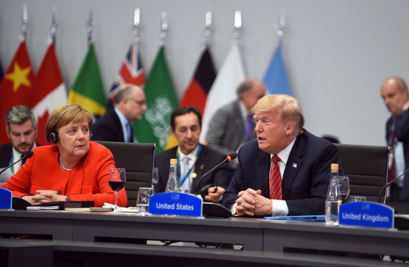 Merkel con Donald Trump en la cumbre del G-20 en Buenos Aires. (Reuters)