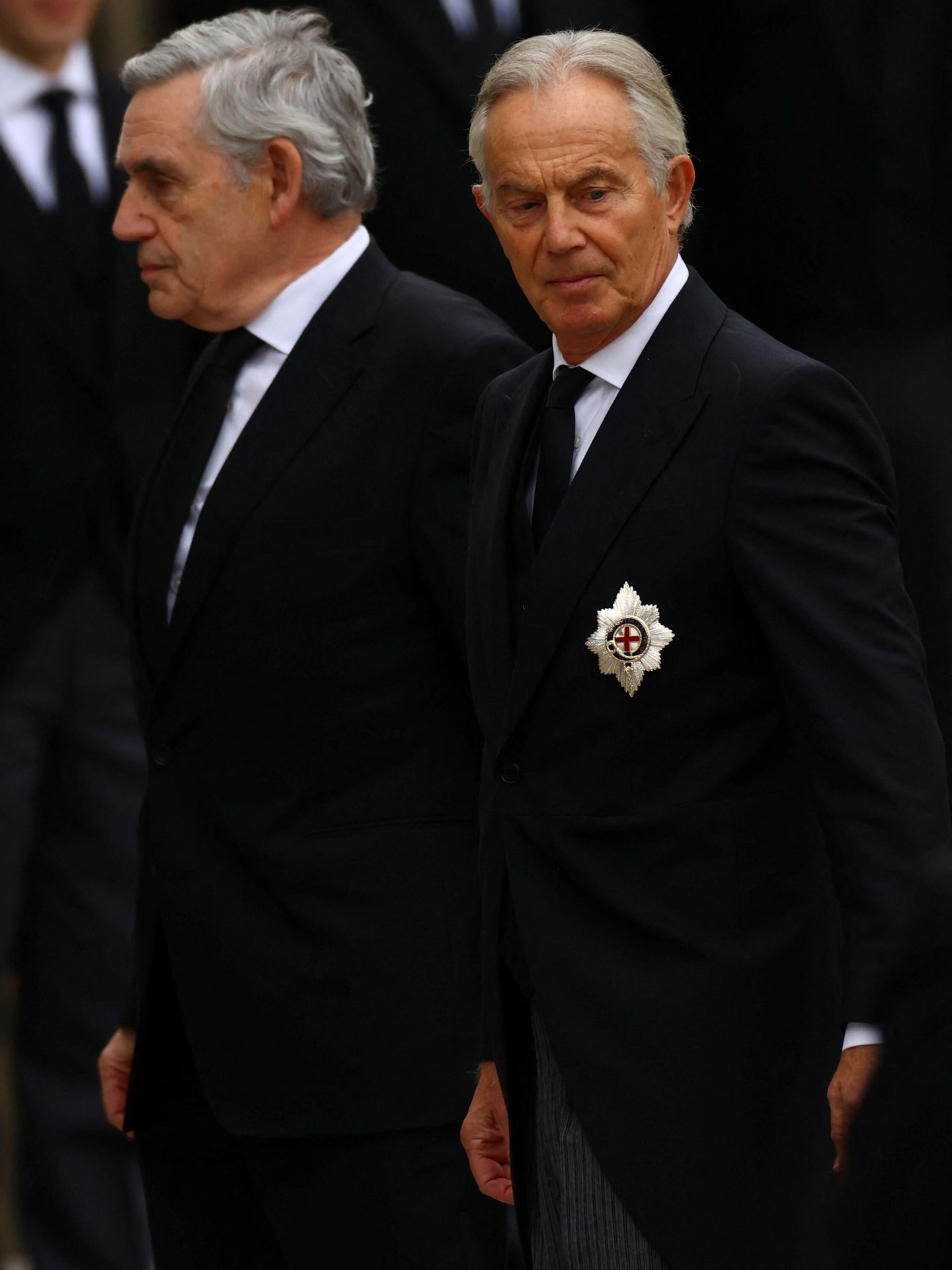 Gordon Brown y Tony Blair, antiguos primeros ministros británicos. (Reuters/Kai Pfaffenbach)