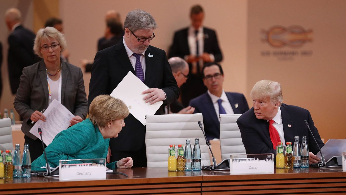 Angela Merkel y Donald Trump durante una sesión de trabajo del G20, en Hamburgo. (Reuters)