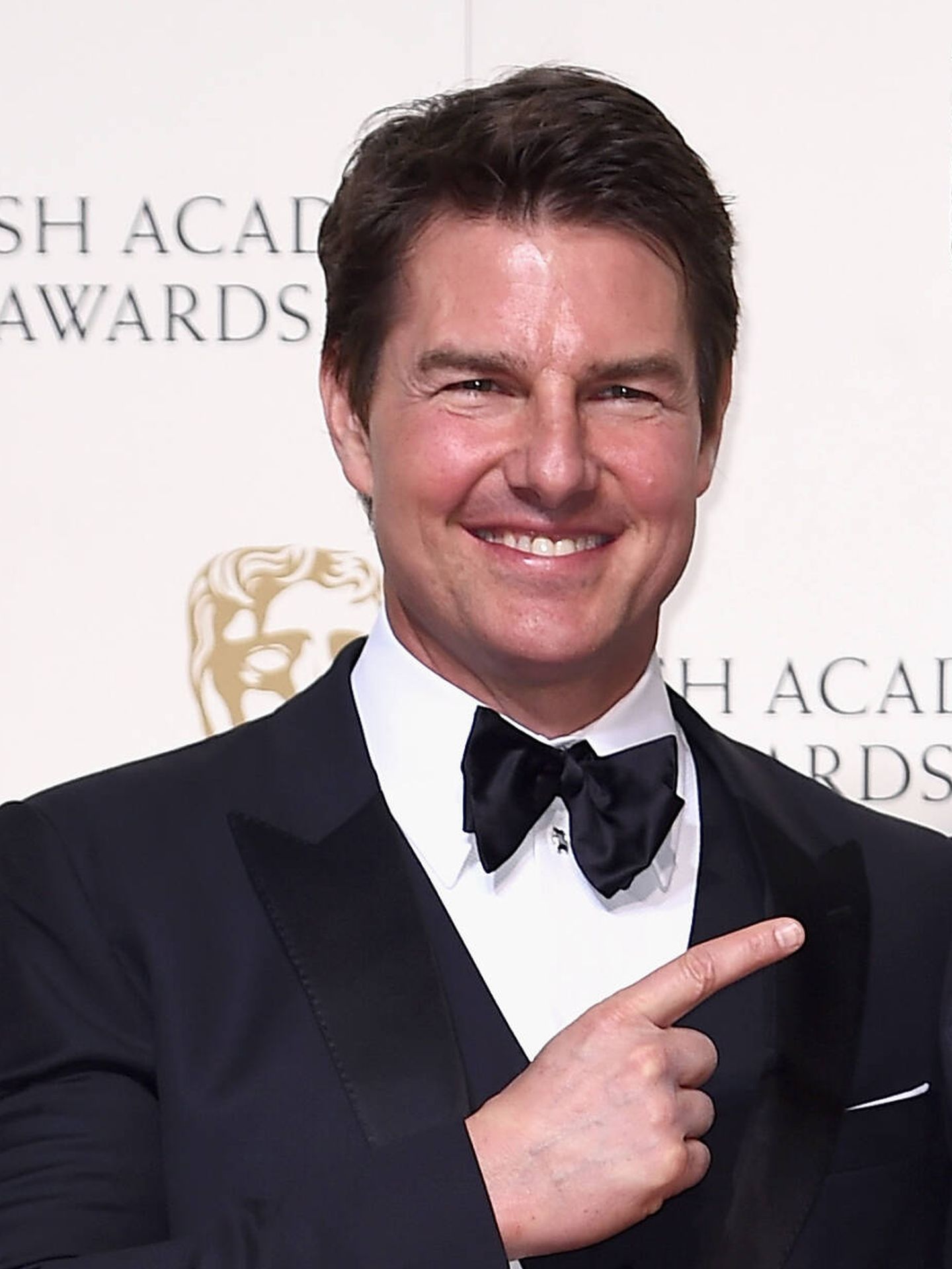 El comentadísimo retoque de Tom Cruise en los BAFTA de 2016. (Getty)