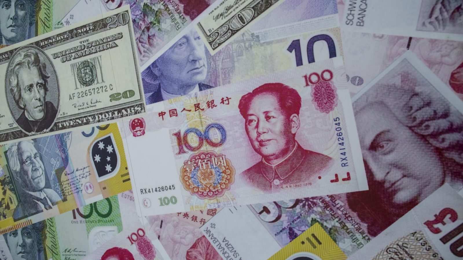 Foto: Imágenes de billetes con el yuan como protagonista. / REUTERS 
