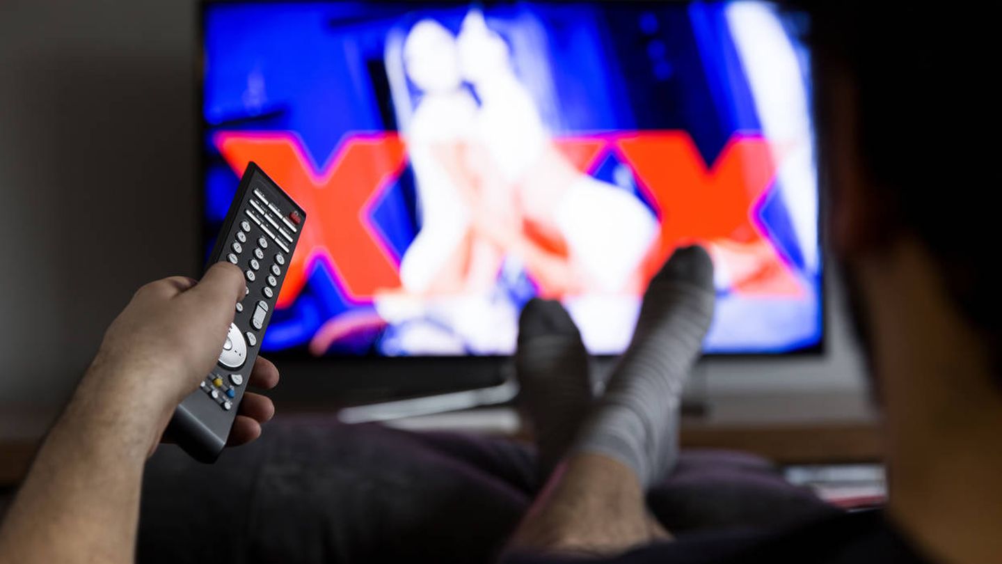 man watching porn on tv