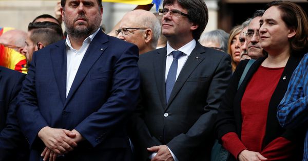 Foto: Junqueras, junto con Puigdemont y Ada Colau. (Reuters)