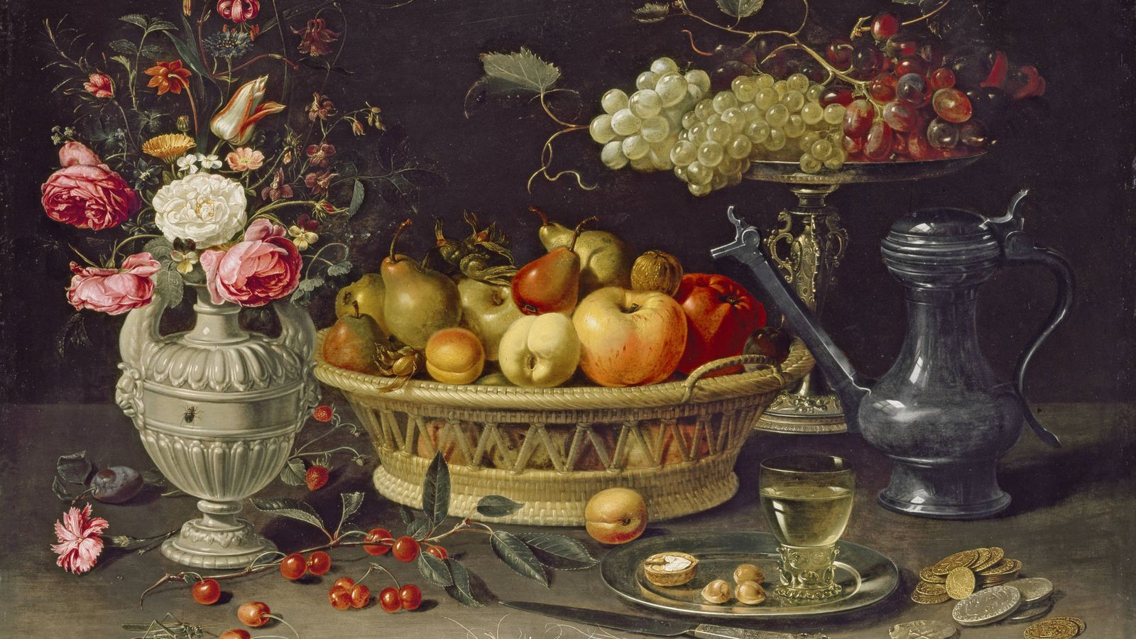 Foto: 'Bodegón con flores, copa de plata dorada, almendras, frutos secos, dulces, panecillos, vino y jarra de peltre', Clara Peeters (1611) (Museo Nacional del Prado)
