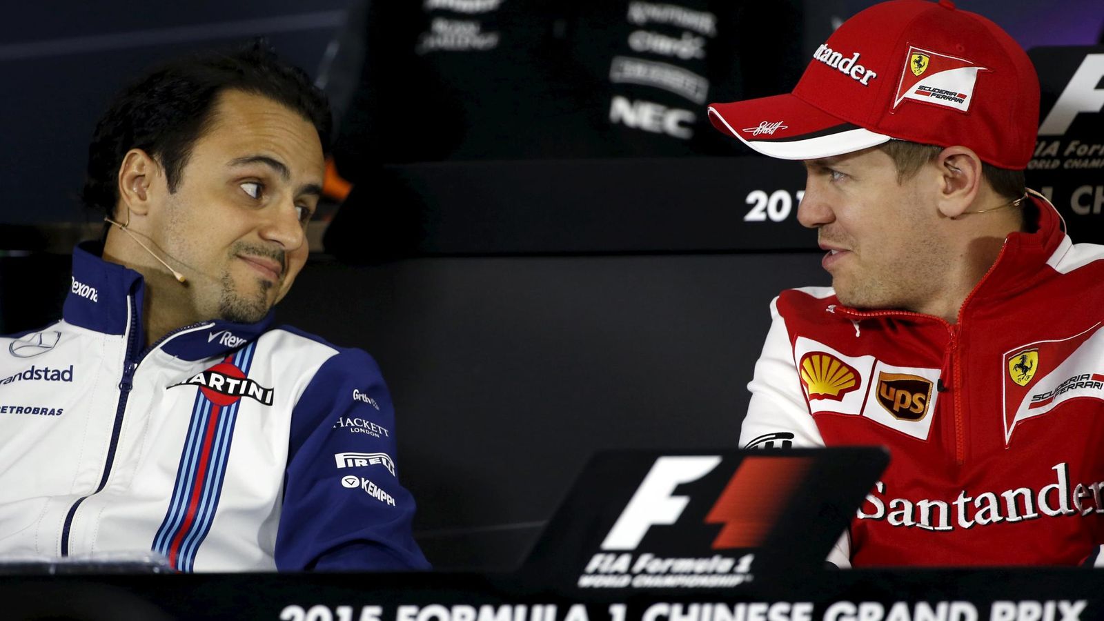 Foto: Felipe Massa hablando con Sebastian Vettel.